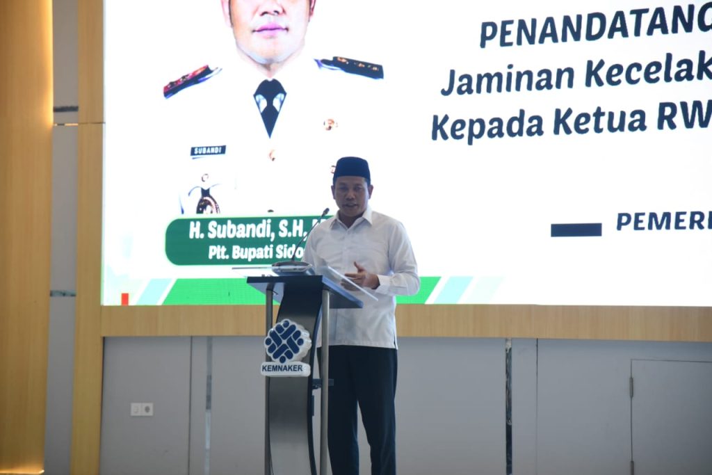 Pemkab Sidoarjo Proteksi 10.931 Ketua RT RW dengan BPJS Ketenagakerjaan program JKK dan JKM BPJS Ketenagakerjaan di launching Plt. Bupati Sidoarjo Subandi di Aula Balai Pelatihan Vokasi dan Produktivitas/BPVP Tulangan