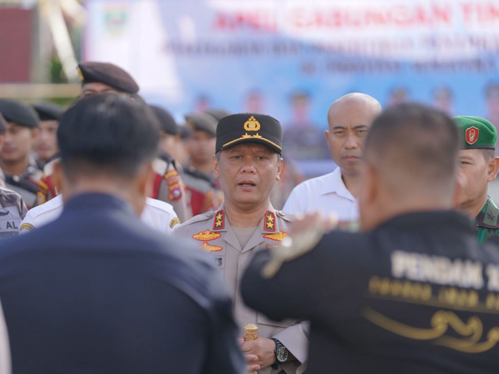 Deretan personel lintas instansi mengikuti apel gabungan Tim Terpadu Pencegahan dan Penertiban PETI di halaman Kantor Gubernur Sumbar, Padang, Rabu (14/1/2026) (Fhoto : Dioni/Gonews.id)